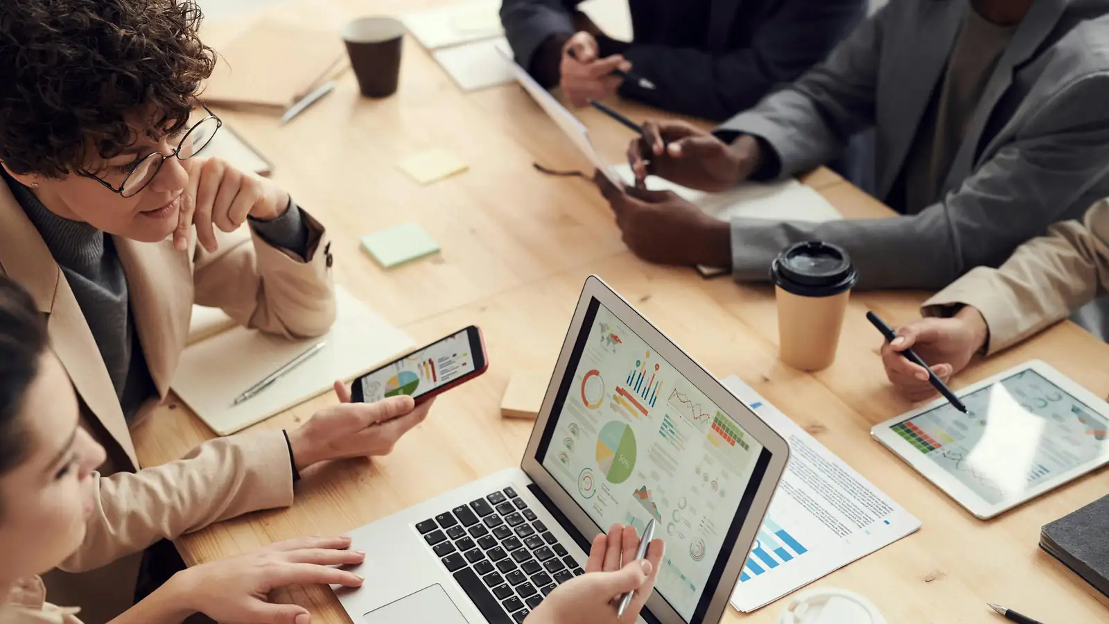 Team planning digital marketing campaigns with analytics